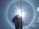 In preparation for the KP4FD IARU World Amateur Radio Day special event operation, Carlos Colon, WP4U, was changing the rotator for a 40 meter antenna on April 11, when a solar halo formed. [Luis Gonzalez, NP4RA, photo]